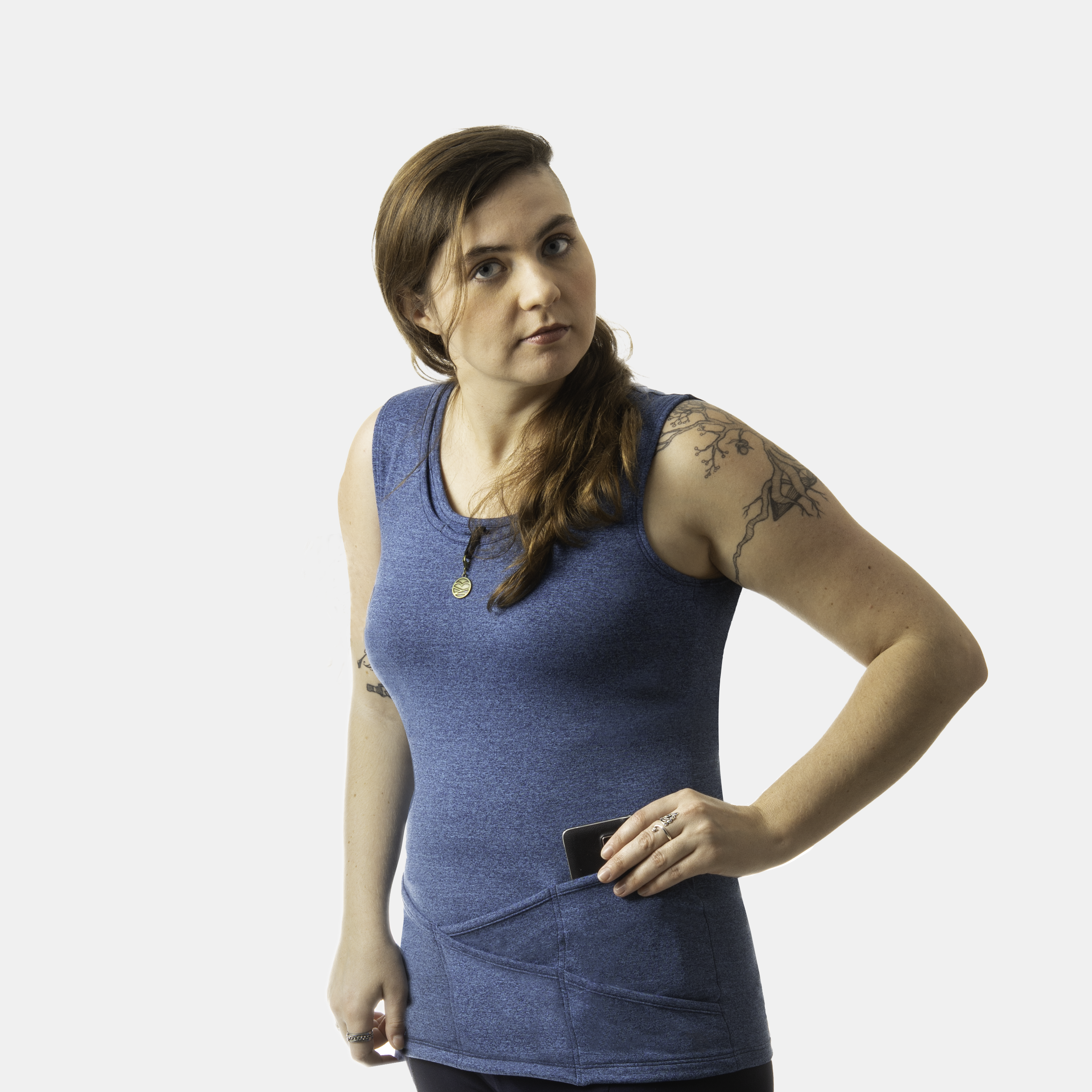 woman wearing cobalt blue tank top with 9 pockets. Taking large phone out of large pocket